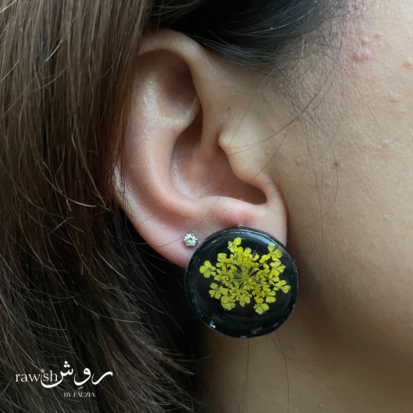 Black floral round earrings