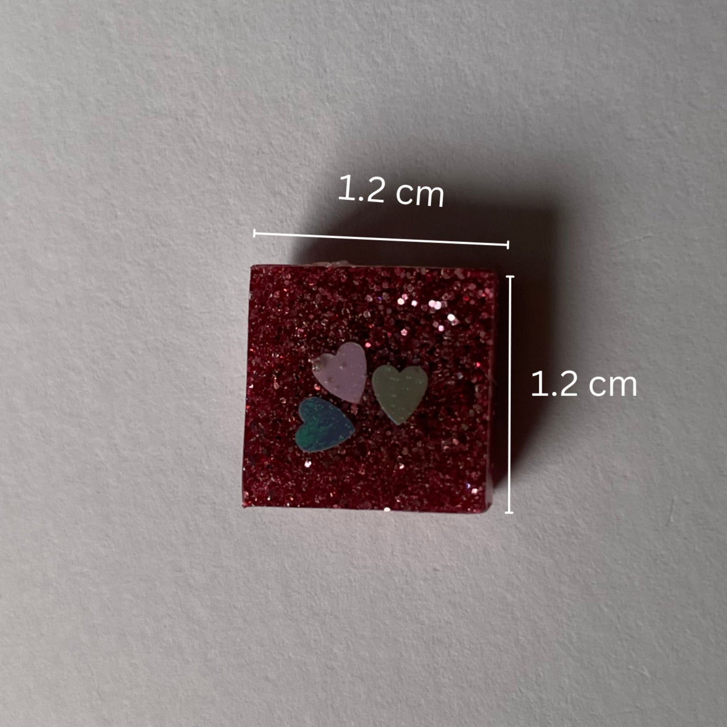 Pink glittery mini studs