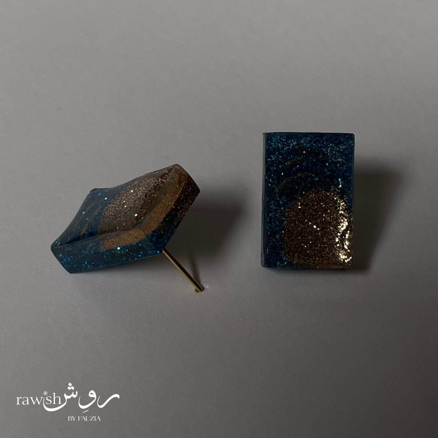 Blue and gold glitter studs