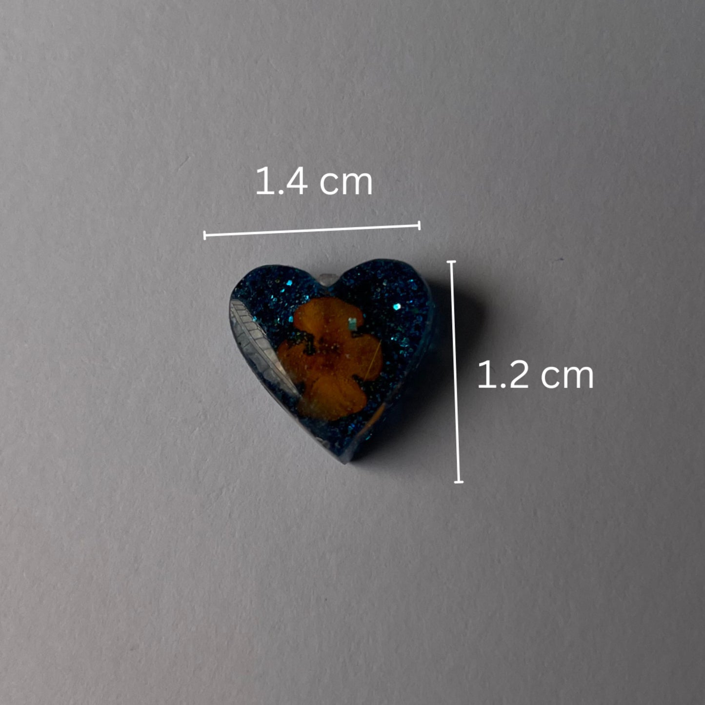 Shimmery blue floral heart studs