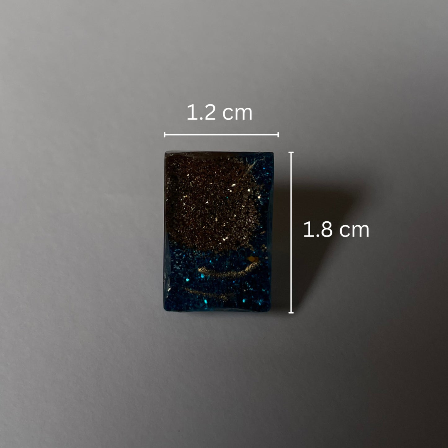 Blue and gold glitter studs