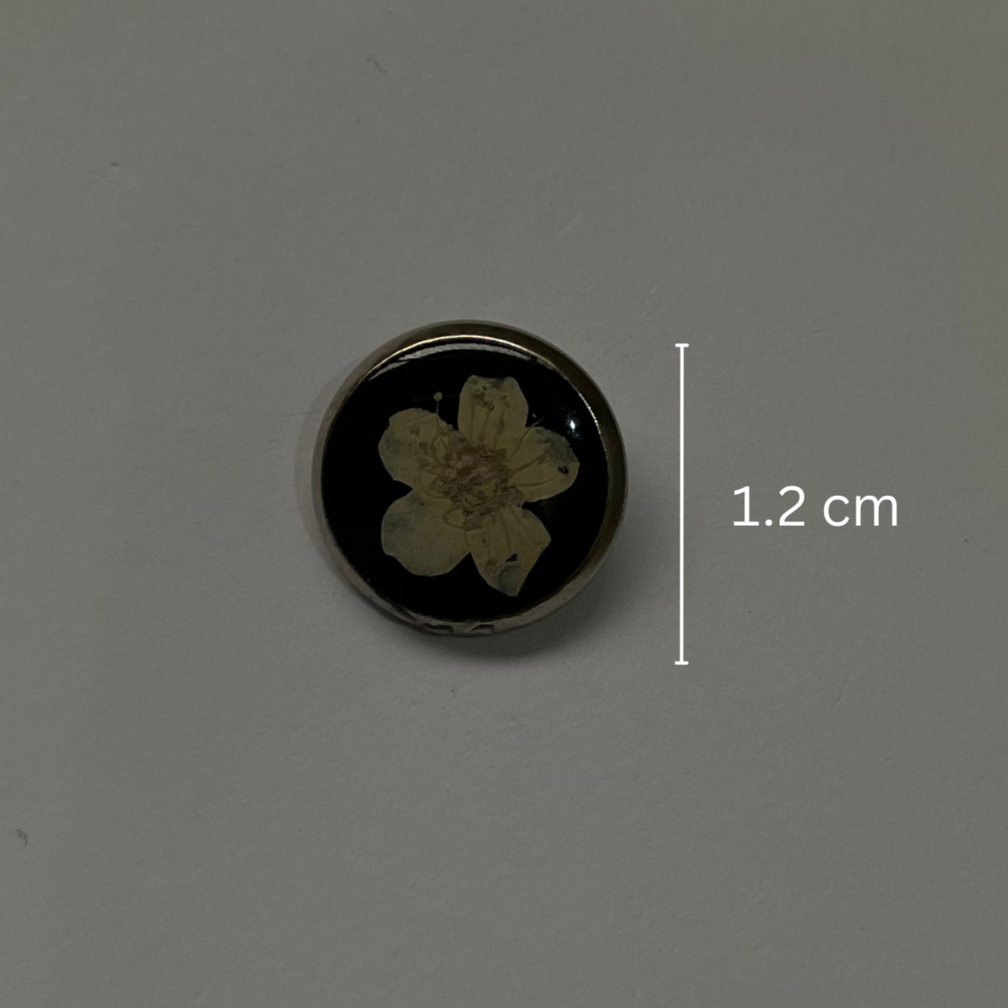 Little blossom black round studs