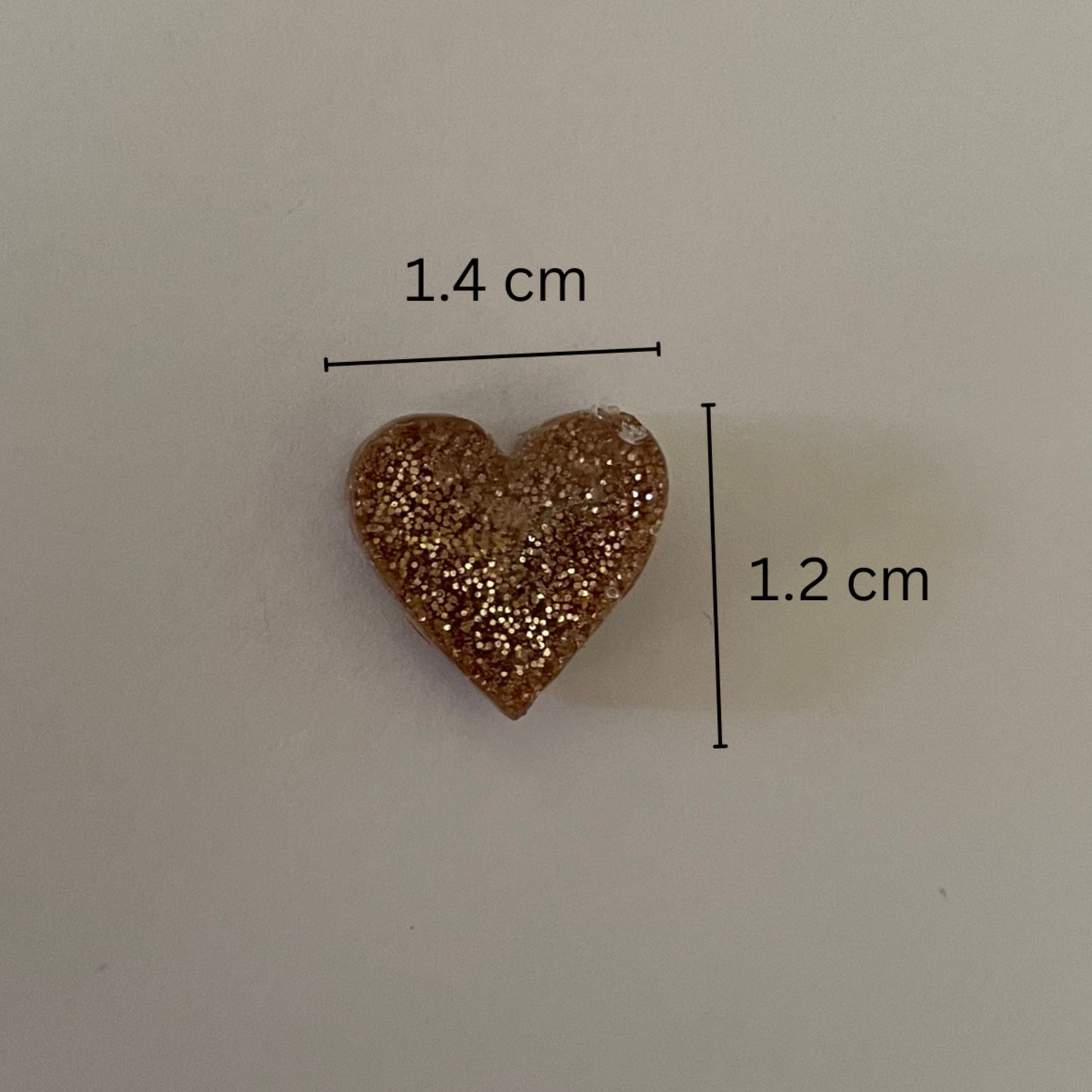 Golden glitter heart studs