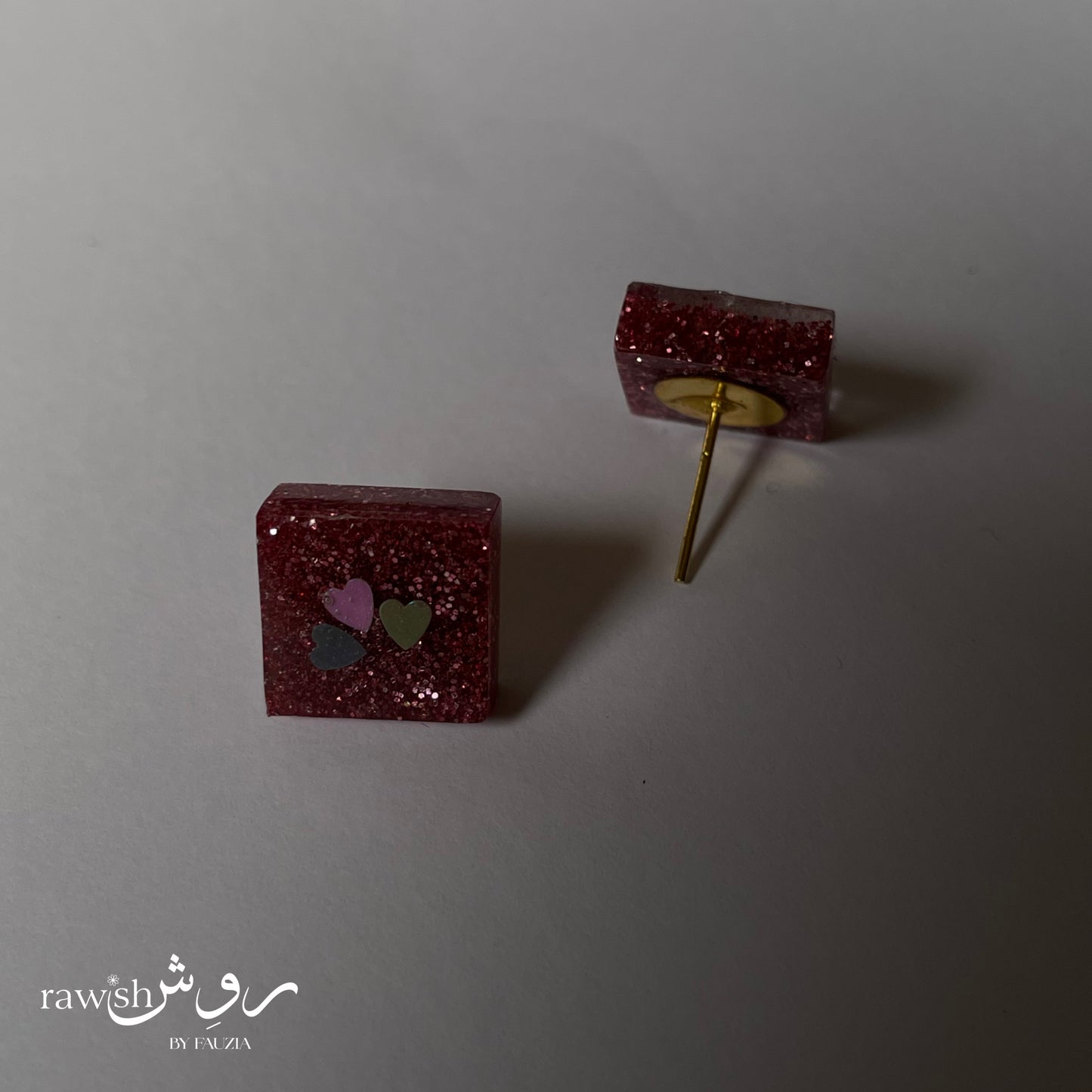 Pink glittery mini studs