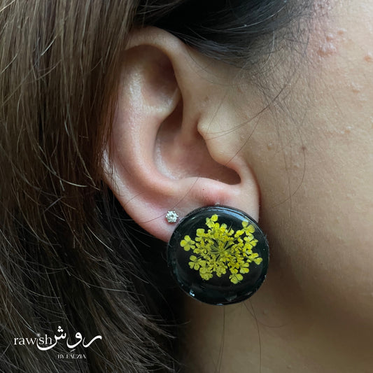 Black floral round earrings