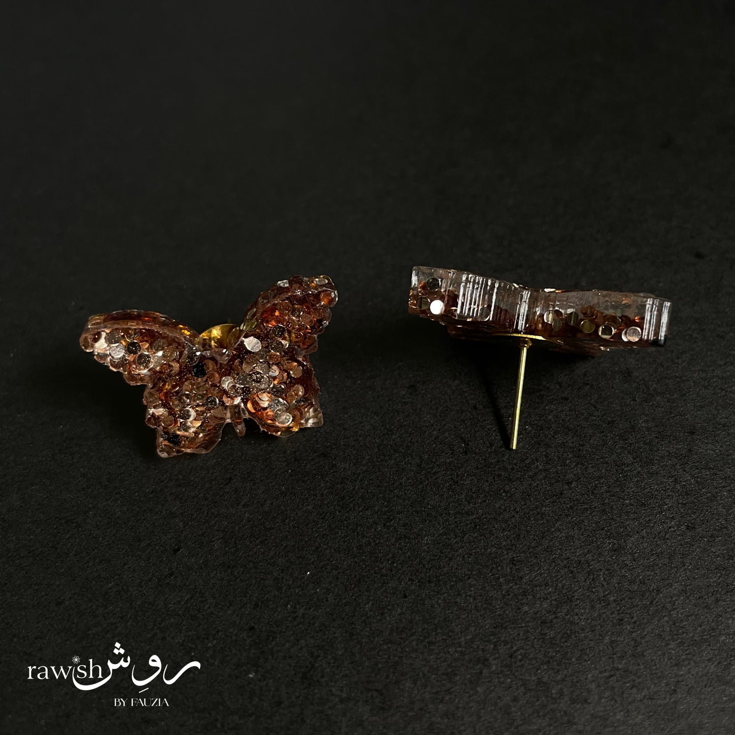 Golden glittery butterfly studs