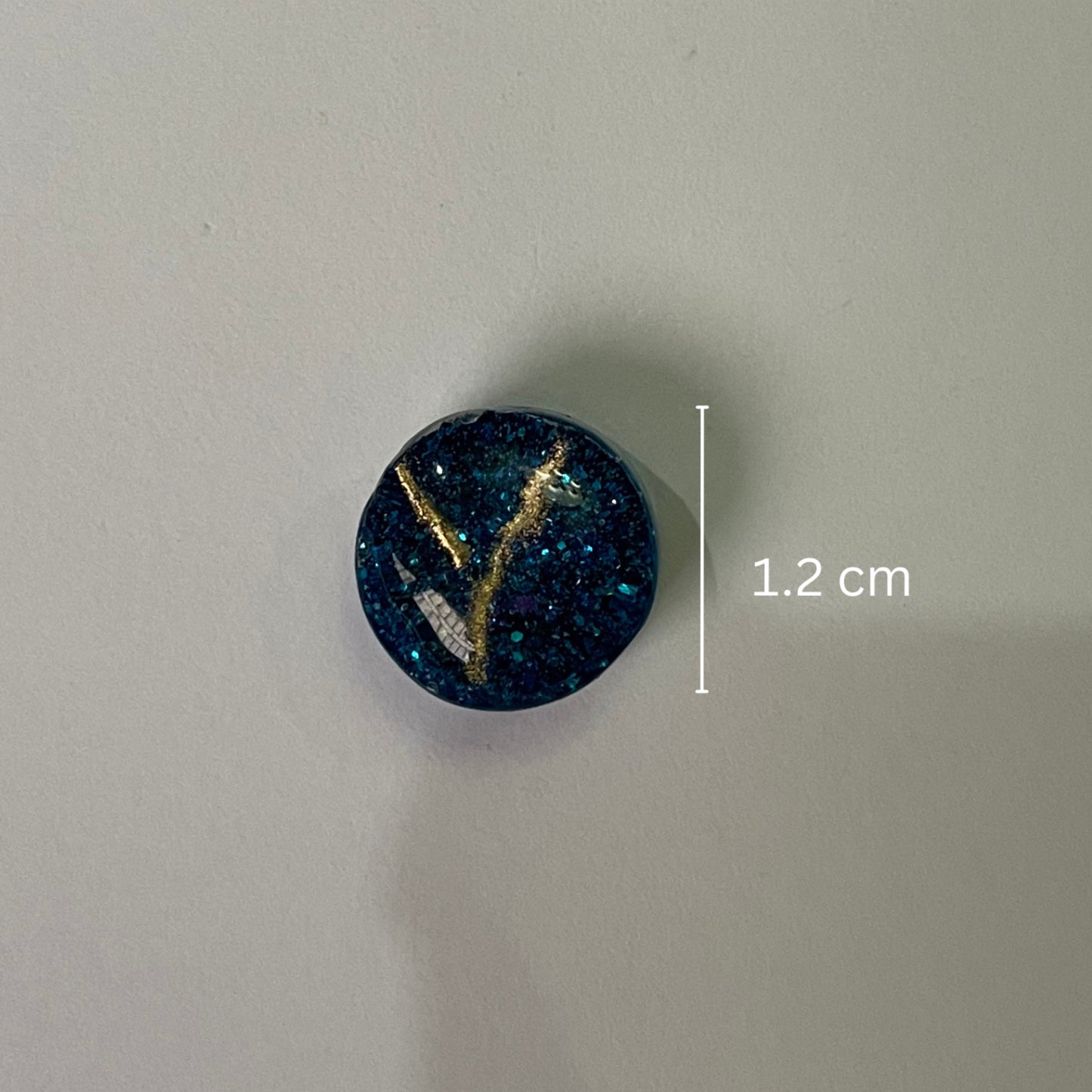 Shimmery blue round studs