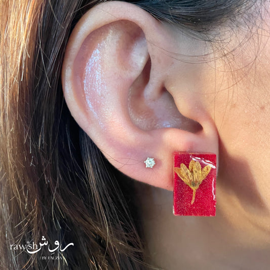 Red and yellow floral studs