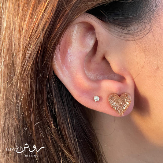 Golden glitter heart studs