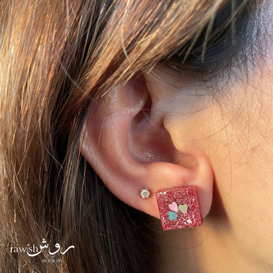 Pink glittery mini studs